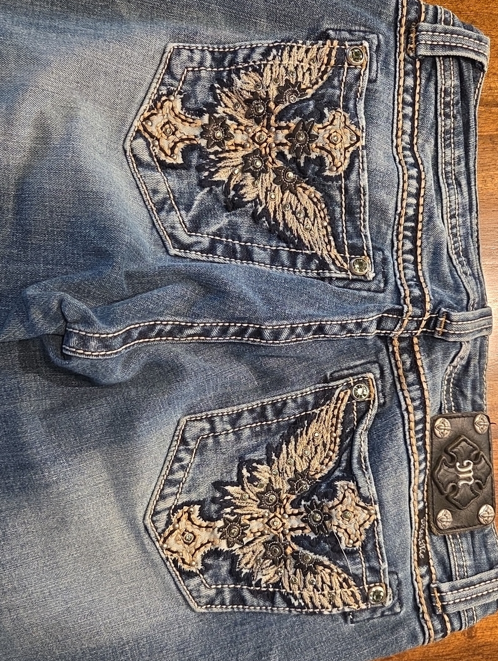 Miss Me Blue Denim Bootcut Jeans with Tan Embroidered Wing Pockets